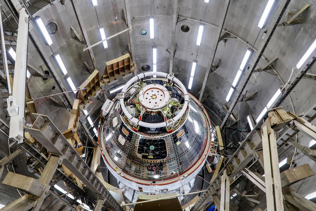 On April 10, 2024, the Artemis II Orion spacecraft is seen inside the west altitude chamber in the Operations and Checkout Building at NASA's Kennedy Space Center in Florida, where it will undergo electromagnetic interference and compatibility testing.